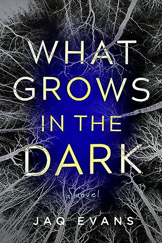 cover image What Grows in the Dark