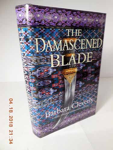 cover image THE DAMASCENED BLADE