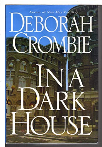 cover image IN A DARK HOUSE