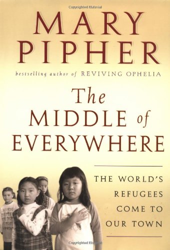 cover image THE MIDDLE OF EVERYWHERE: The World's Refugees Come to Our Town 