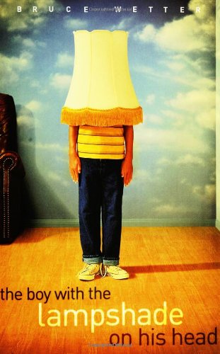 cover image THE BOY WITH THE LAMPSHADE ON HIS HEAD