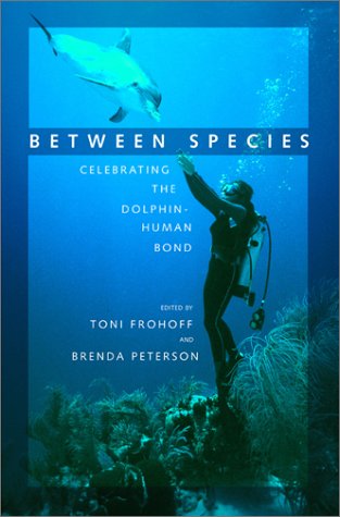 cover image Between Species: Celebrating the Dolphin-Human Bond