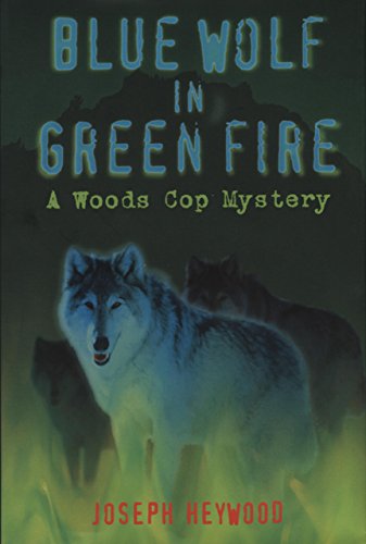 cover image BLUE WOLF IN GREEN FIRE: A Woods Cop Mystery